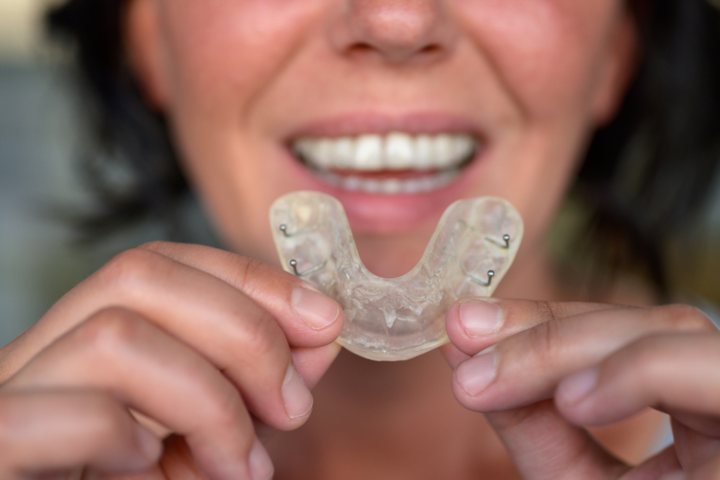 woman smiling with mouth guard