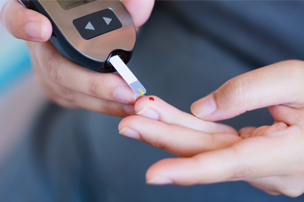 person checking blood sugar