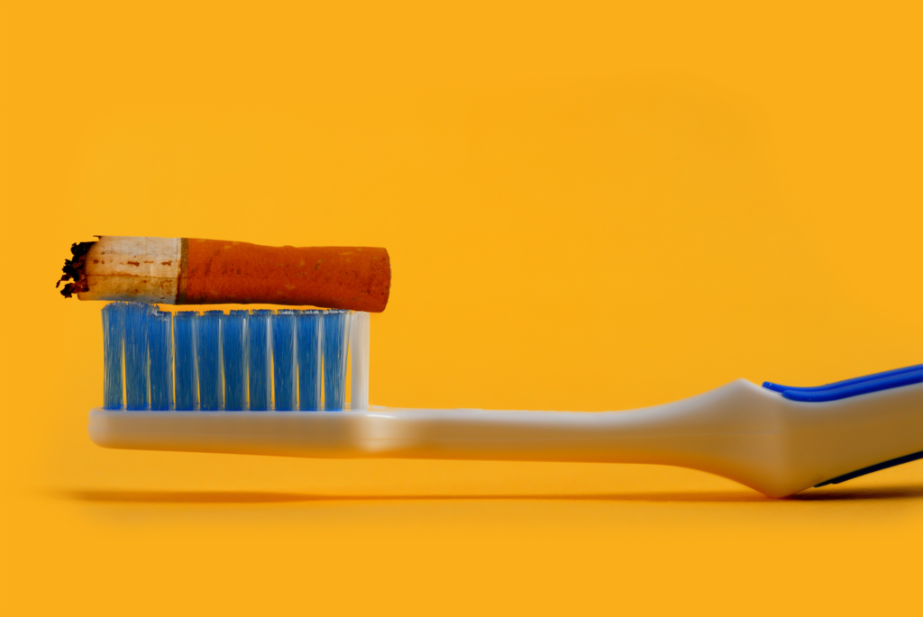 cigarette on toothbrush